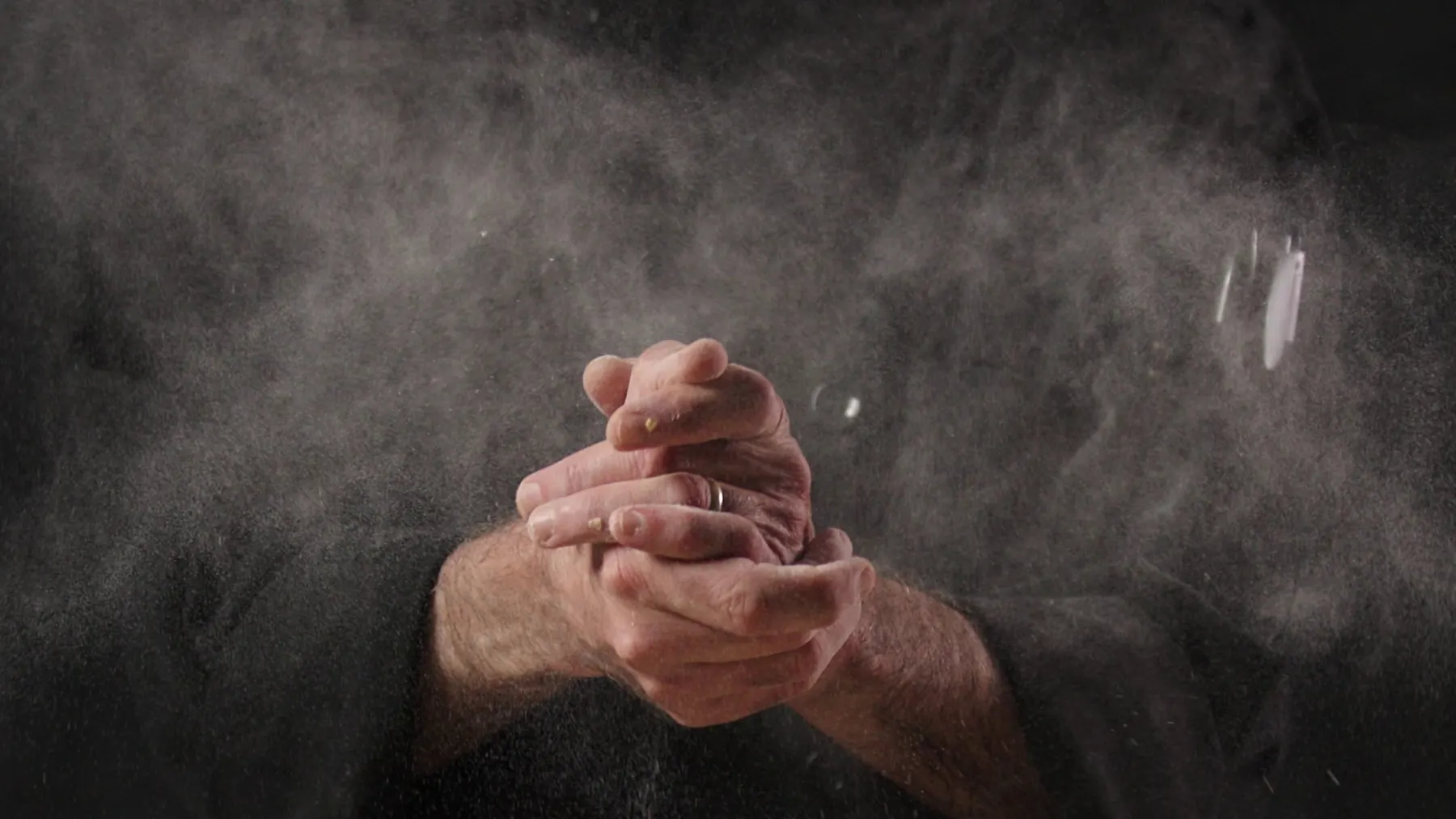 Hands dusted with flour